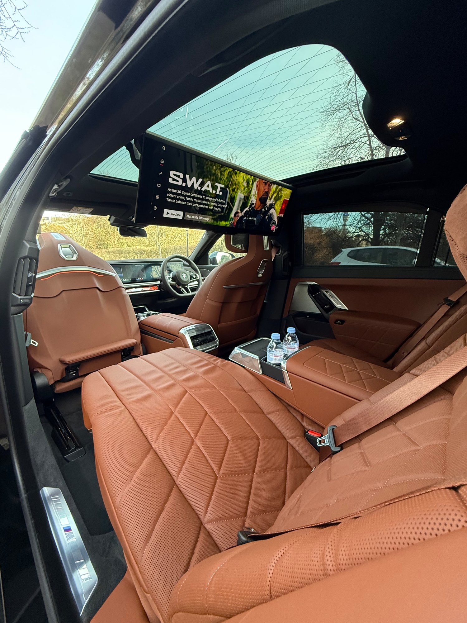 Rear lounge seating in a Halcolux BMW 7 Series